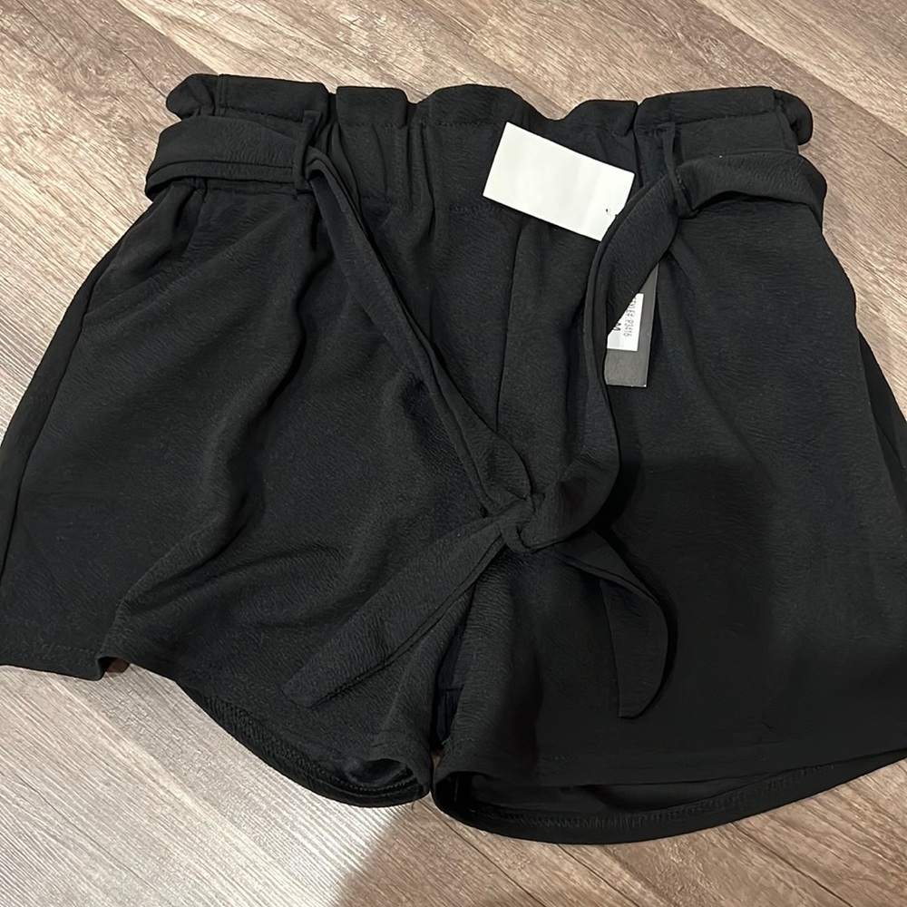 Brand New Dress shorts. Size M Women